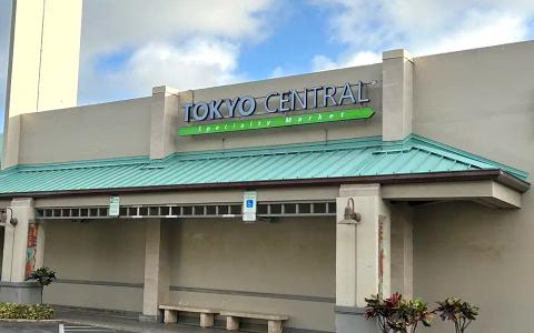 Tokyo Central Specialty Market storefront with closed roller doors and turquoise roof