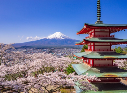Mount Fuji with cherry blossoms and red Japanese pagoda in spring landscape