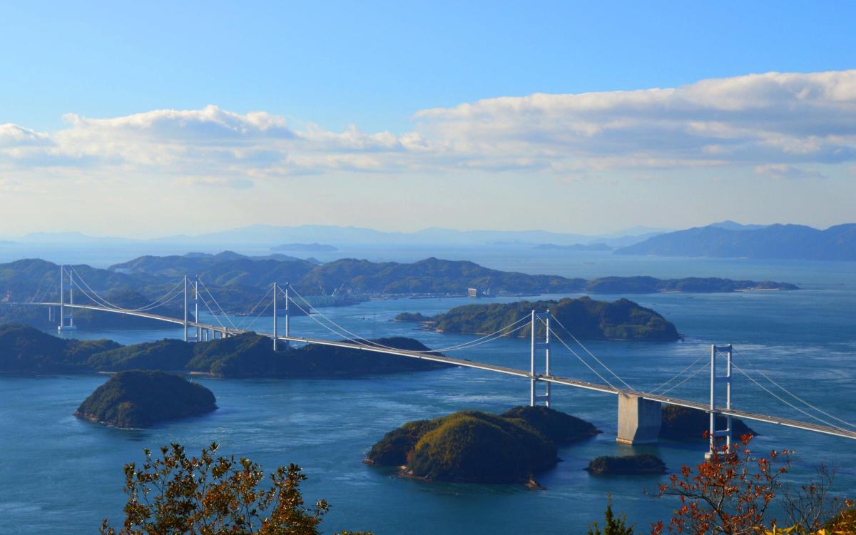 Kurushima Kaikyo Bridge spanning the blue Seto Inland Sea and surrounding islands