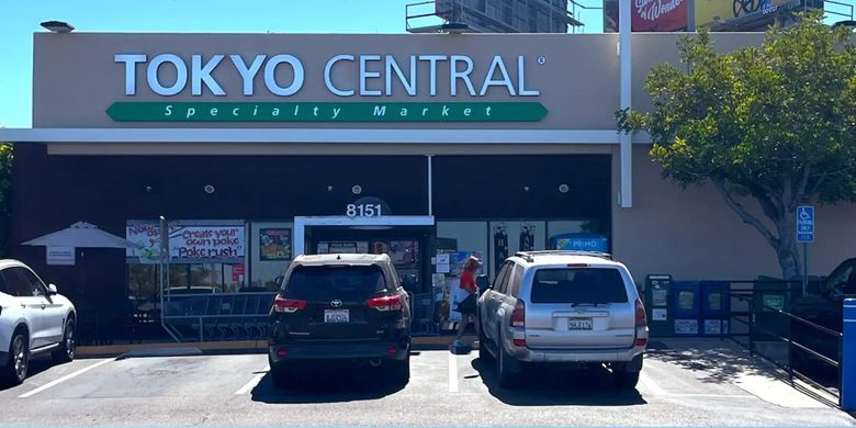 Tokyo Central Specialty Market storefront at 8151 with parked cars and entrance