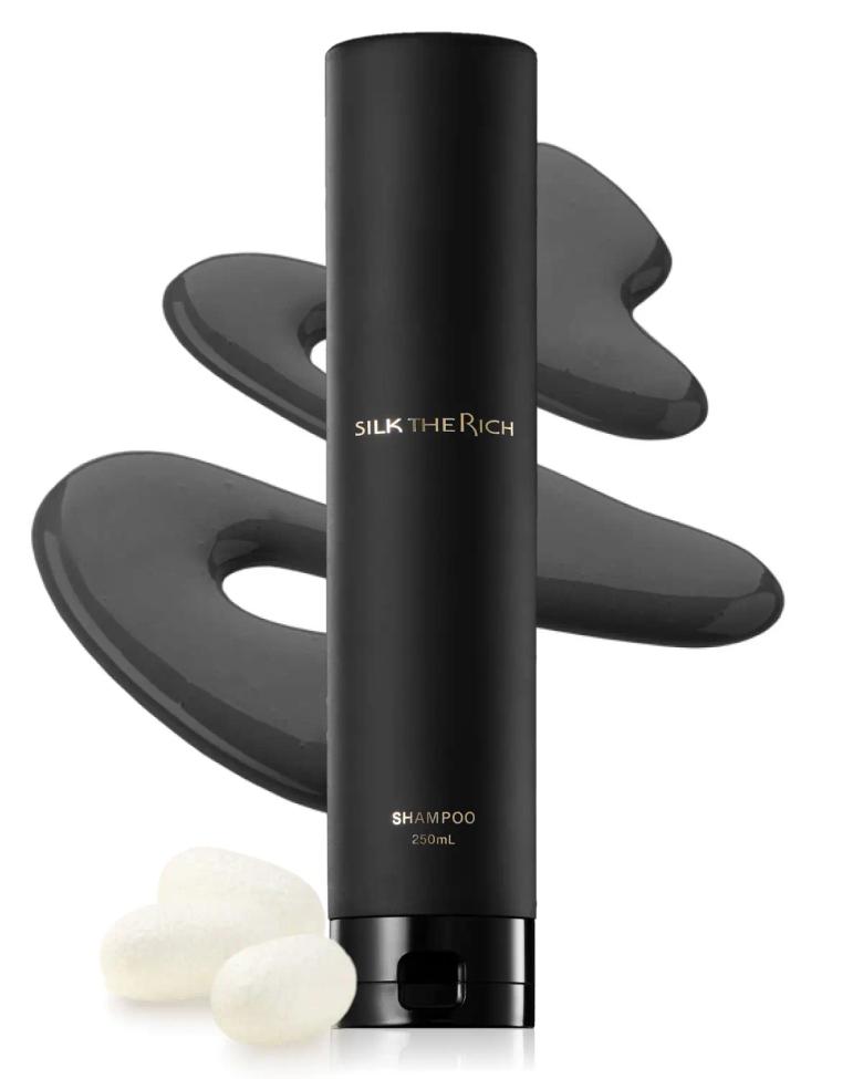 Silk The Rich shampoo 250mL bottle with black styling paddles and white product samples