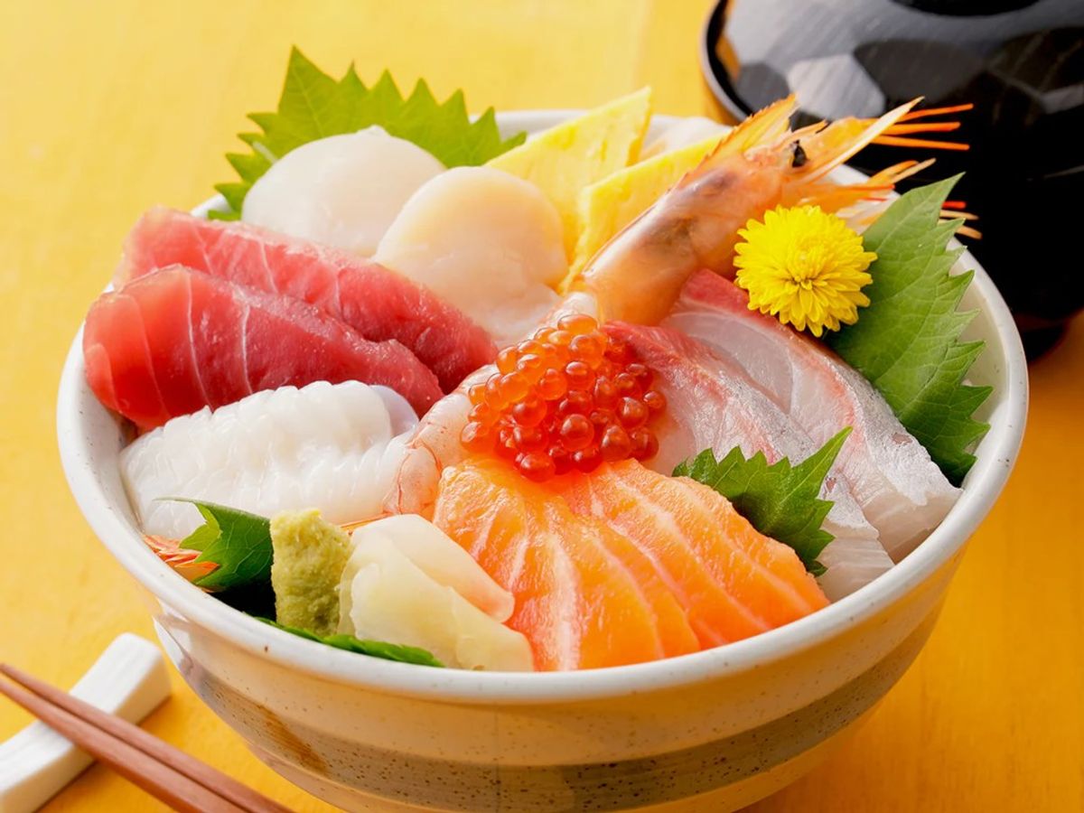 Assorted sashimi bowl with salmon, tuna, scallop, shrimp, and ikura roe