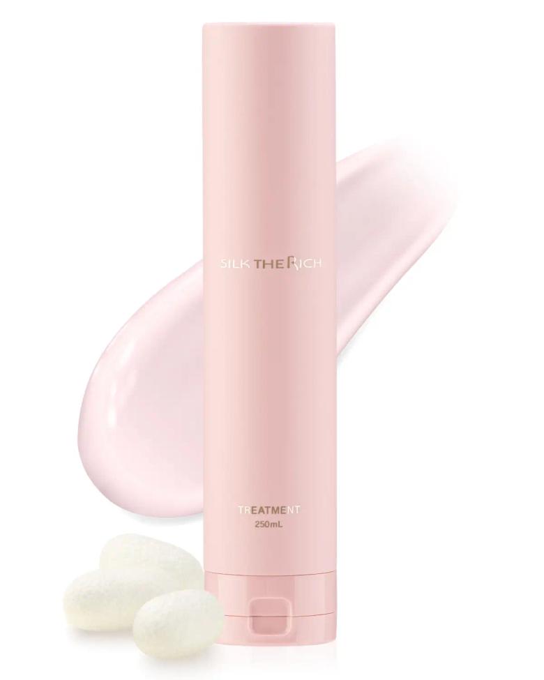 Pink cylindrical beauty product bottle, 250mL, with silk texture and cream pearls displayed