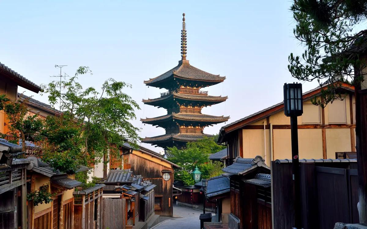 Traditional Japanese pagoda and wooden buildings in historic Kyoto temple district